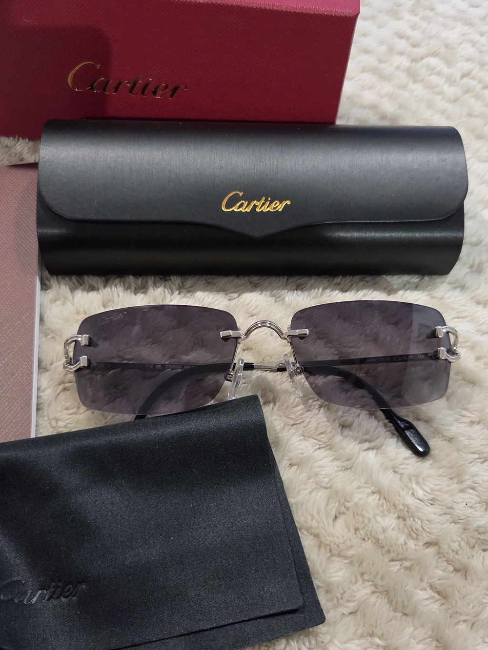 Cartier Men's Rimless Sunglasses with Dark Grey Lenses and Silver Bridge